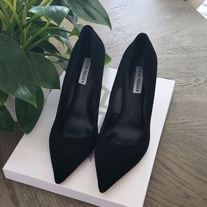 Black suede pumps